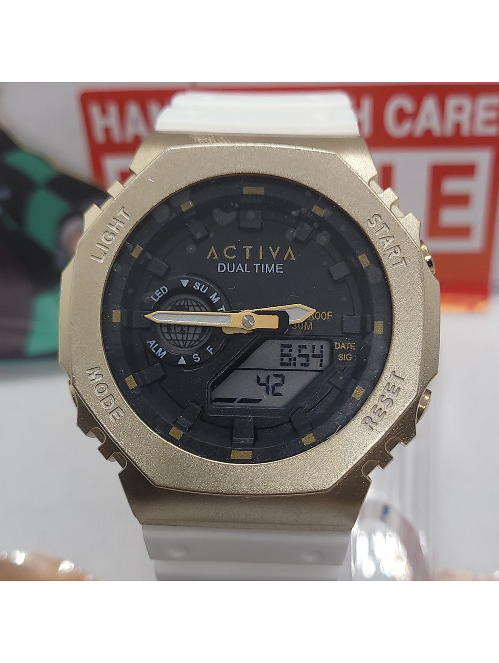 309 activa Recon 45.5mmdual time sport wristwatch gold case white silicone strap